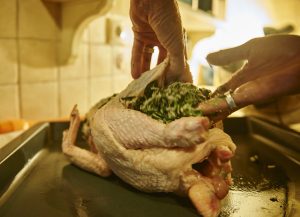 Stuffing a chicken